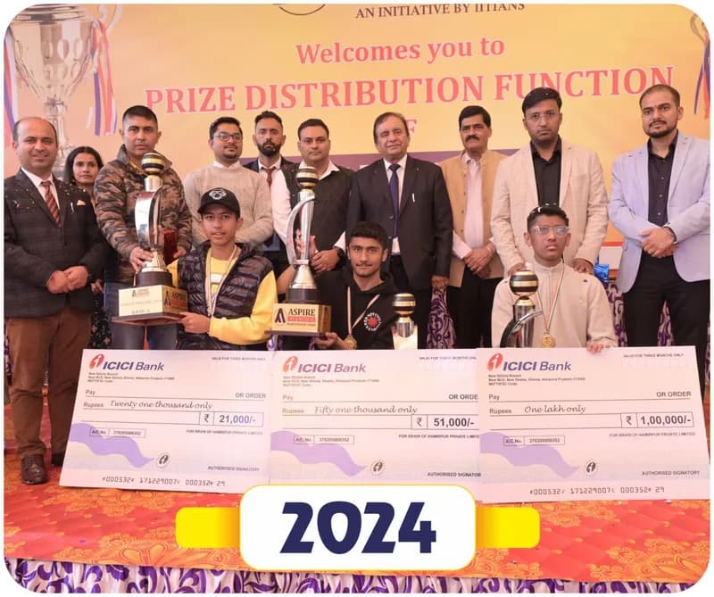 Brain of Himachal 2024 prize distribution: winners holding trophies and large scholarship cheques with dignitaries on stage (year label printed on the image)