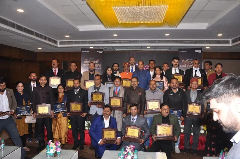 Group photo of awardees holding plaques at the Himachal Achievers 2021 event