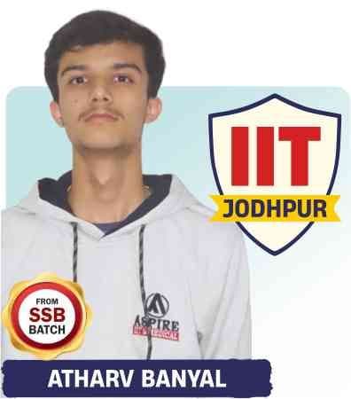 JEE 2026 result card: portrait of Atharv Banyal in an Aspire hoodie showing a victory sign, with the name and "IIT Jodhpur" printed on the card