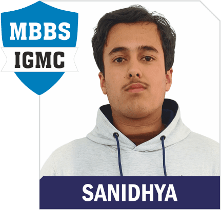 NEET 2025 result card: portrait of Sanidhya in an Aspire hoodie, with the name and "MBBS IGMC" printed on the card