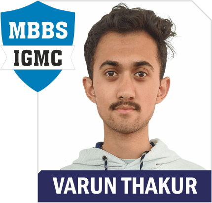 NEET 2025 result card: portrait of Varun Thakur in an Aspire hoodie, with the name and "MBBS IGMC" printed on the card