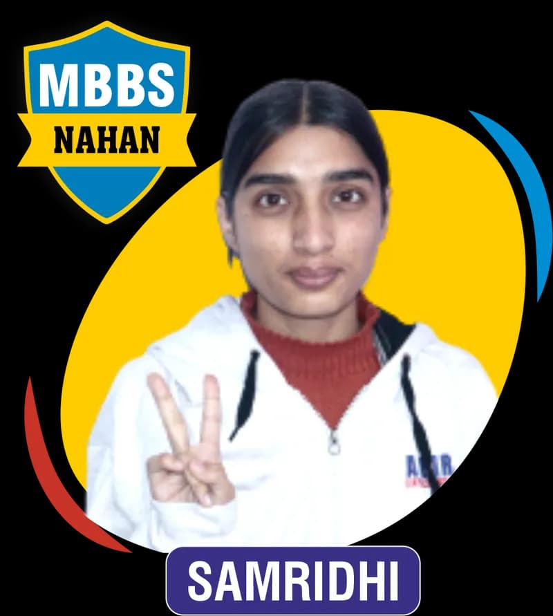 NEET 2023 result card from Aspire IIT & Medical: portrait of a selected student in an Aspire hoodie, with the student's name and allotted medical college printed on the card