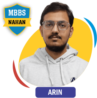 NEET 2022 result card from Aspire IIT & Medical: portrait of a selected student in an Aspire hoodie, with the student's name and allotted medical college printed on the card