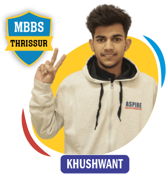 NEET 2022 result card from Aspire IIT & Medical: portrait of a selected student in an Aspire hoodie, with the student's name and allotted medical college printed on the card