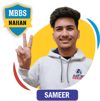 NEET 2022 result card from Aspire IIT & Medical: portrait of a selected student in an Aspire hoodie, with the student's name and allotted medical college printed on the card