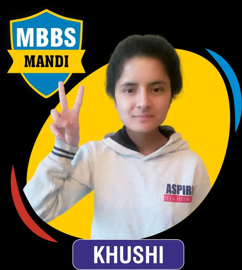 NEET 2021 result card from Aspire IIT & Medical: portrait of a selected student in an Aspire hoodie, with the student's name and allotted medical college printed on the card