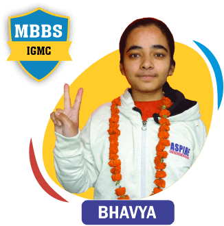 NEET 2020 result card from Aspire IIT & Medical: portrait of a selected student in an Aspire hoodie, with the student's name and allotted medical college printed on the card