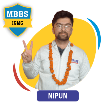 NEET 2020 result card from Aspire IIT & Medical: portrait of a selected student in an Aspire hoodie, with the student's name and allotted medical college printed on the card